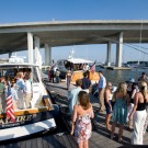 SCENE members mingle on the yachts and dock provided by Coastal Yacht Charters.